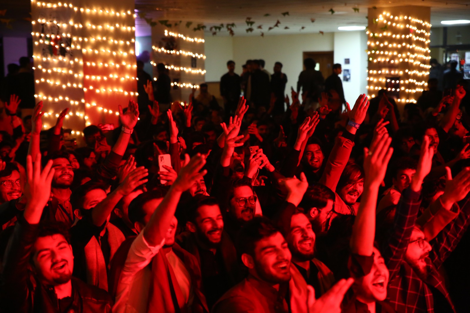 The crowd celebrating at a NaSCon event